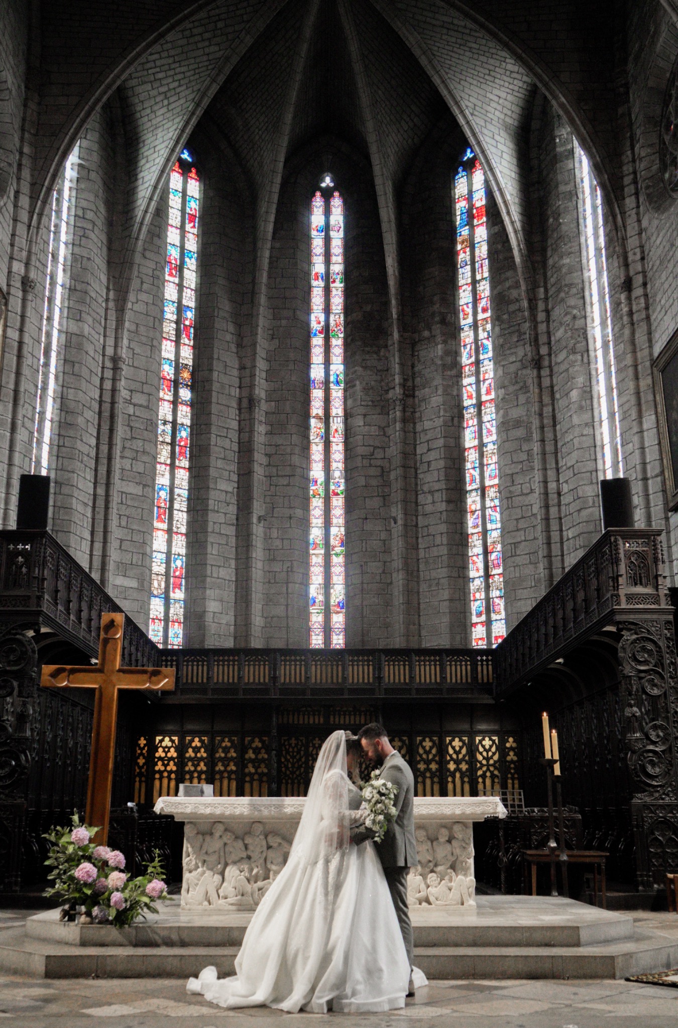 Newlyweds inside a grand church
