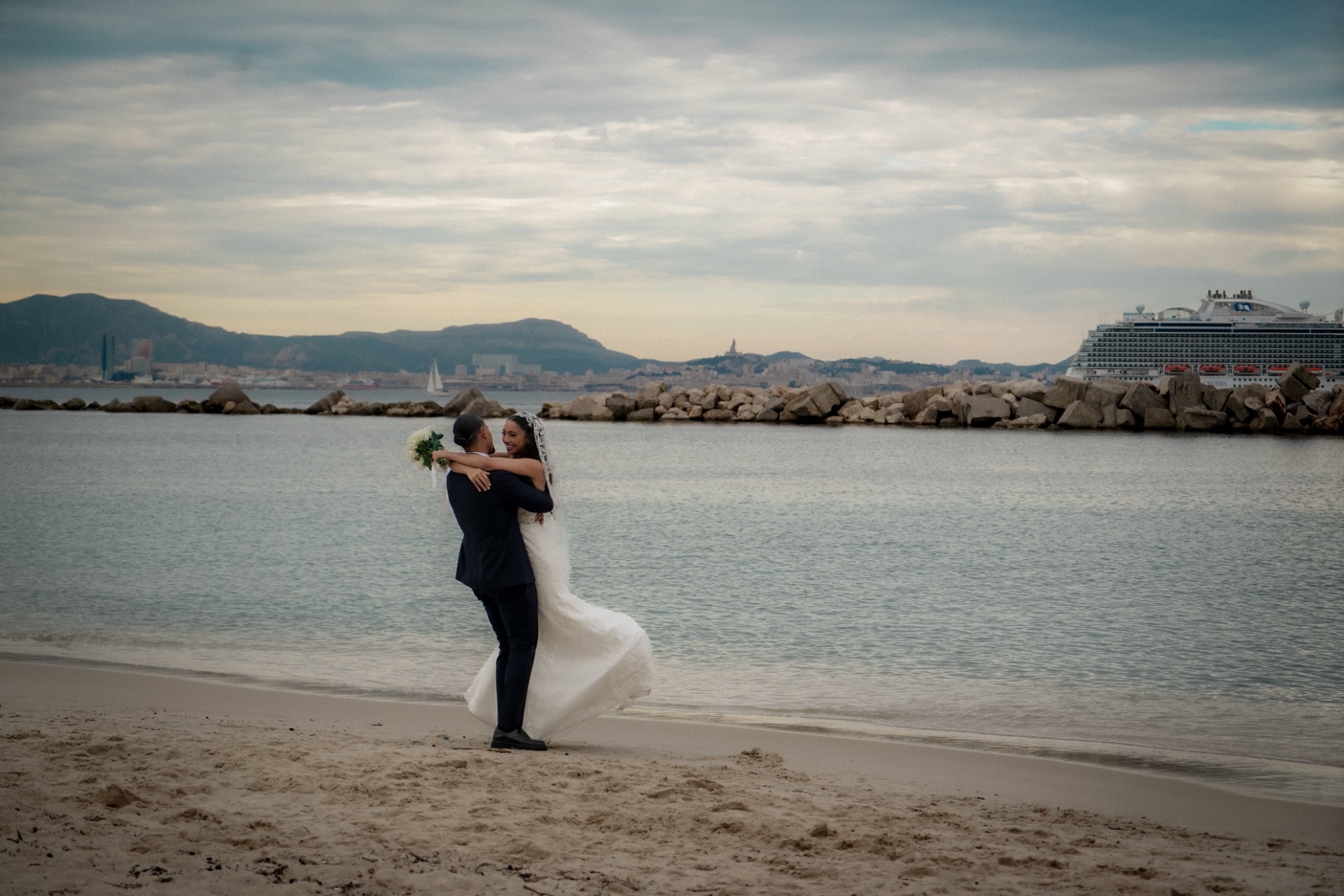 Newlyweds by the sea
